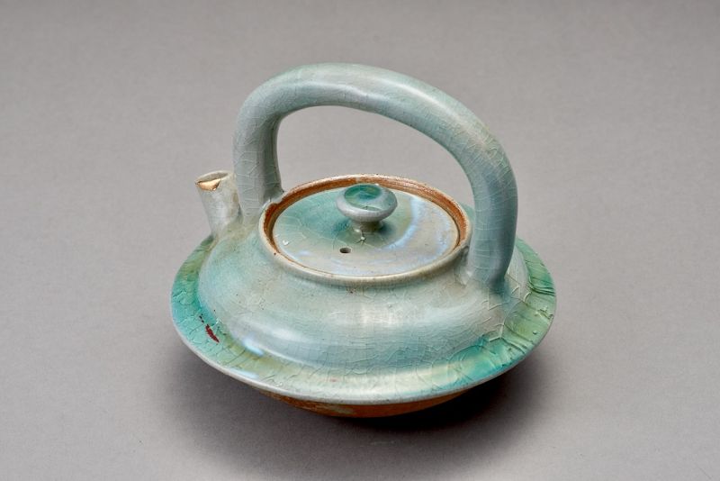 An Antique Celadon Chōshi for Sake with a Beautiful Gold Repair