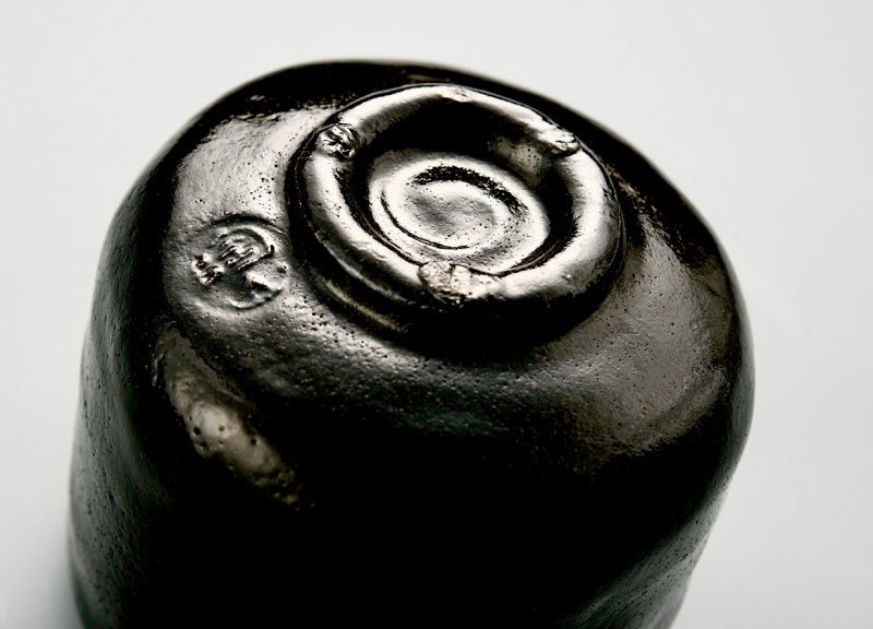 A Black Raku Tea Bowl by Ito Tozan