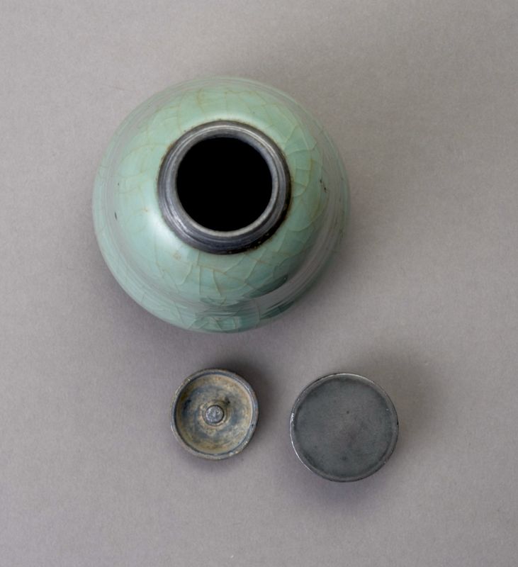 An Antique Celadon Tea Container with Pewter Cap