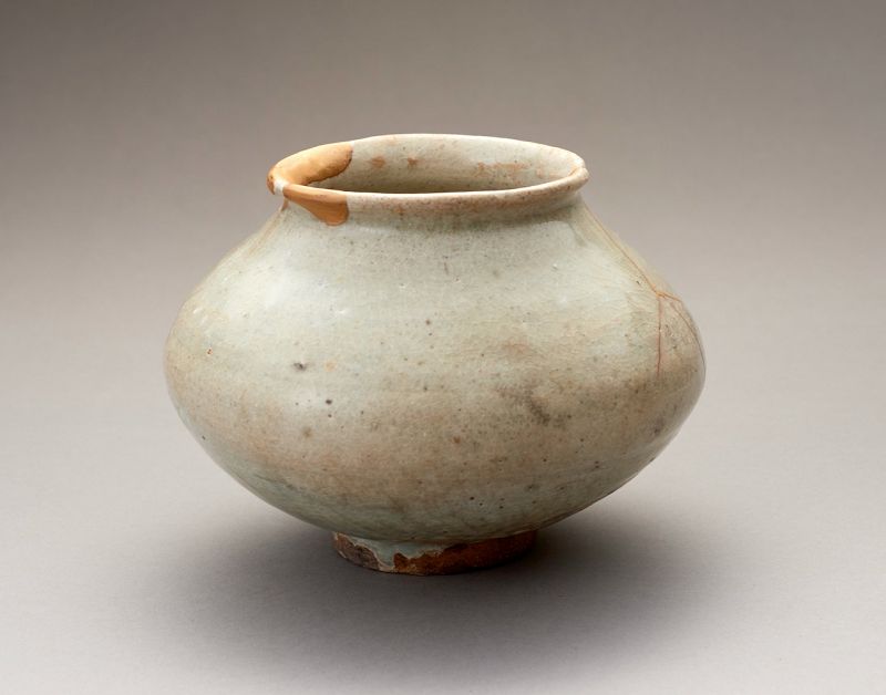 An Ancient Korean Celadon Vase with Gold Repairs