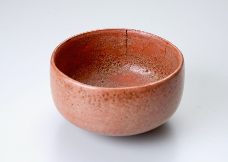 A Red Raku Tea Bowl by Tamamizu III - Nindosai (d.o.b. unknown -1763)
