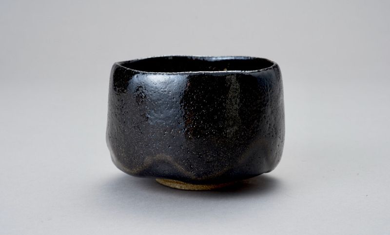 A Classic Black Raku Tea Bowl by Ōhi Chōzaemon IX
