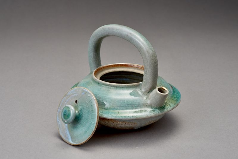 An Antique Celadon Chōshi for Sake with a Beautiful Gold Repair