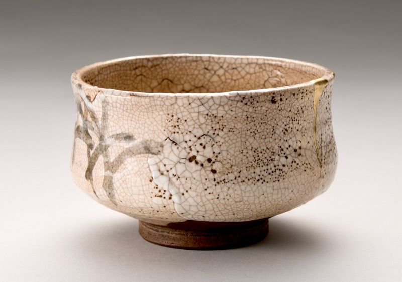 An Edo Period Shino Tea Bowl with Gold Repairs