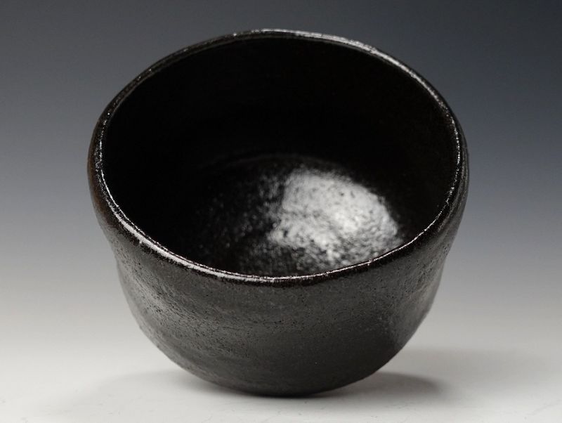 A Black Raku Tribute Tea Bowl by Kiraku Kizu