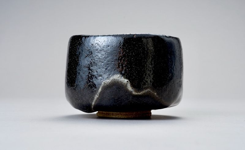 A Classic Black Raku Tea Bowl by Ōhi Chōzaemon IX