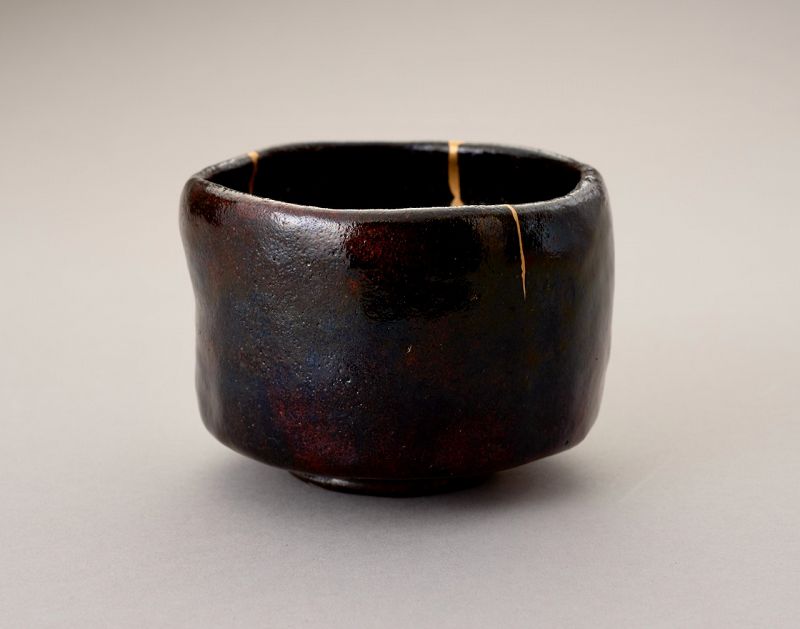 An Exceptional Antique Raku Tea Bowl with Gold Repair
