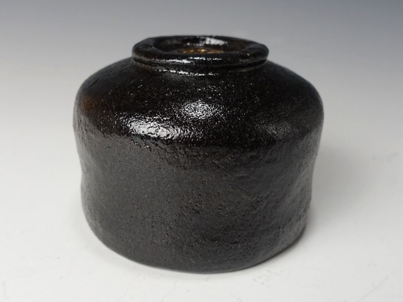 A Black Raku Tribute Tea Bowl by Kiraku Kizu