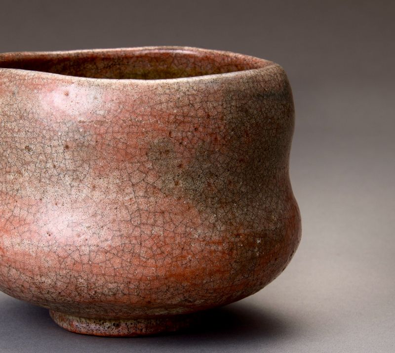A Red Raku Tea Bowl by Famed Potter Ichigen (1662-1722)