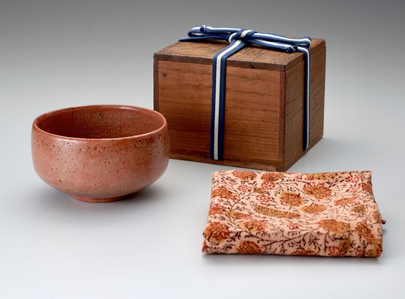 A Red Raku Tea Bowl by Tamamizu III - Nindosai (d.o.b. unknown -1763)