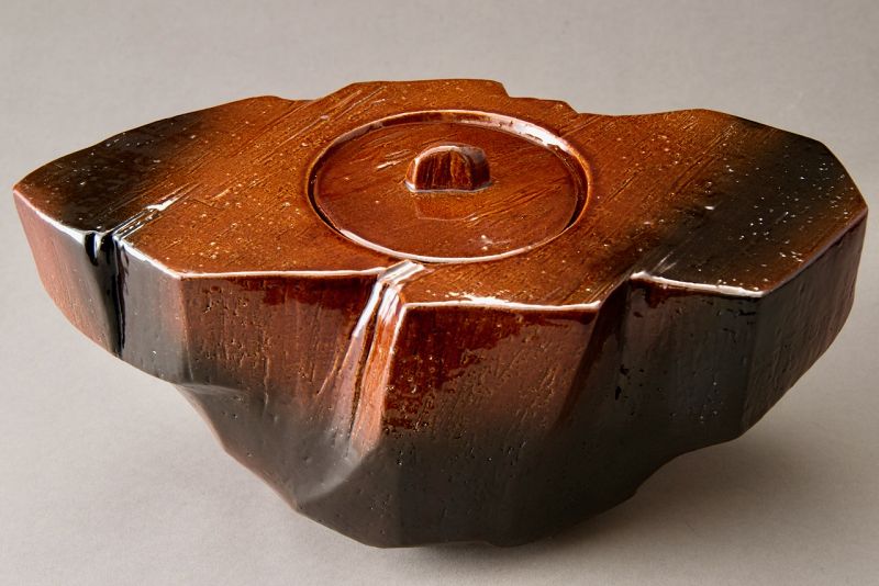 A Red “Ame” Glazed Mizusashi by 11th Generation Ōhi Chozaemon