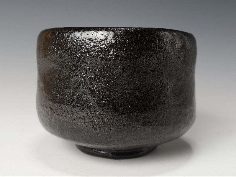 A Black Raku Tribute Tea Bowl by Kiraku Kizu