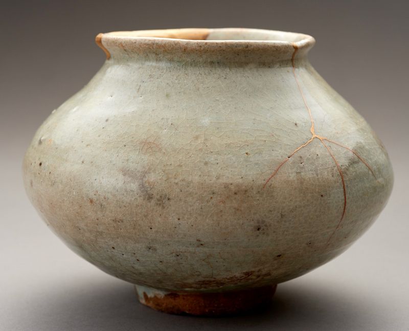 An Ancient Korean Celadon Vase with Gold Repairs