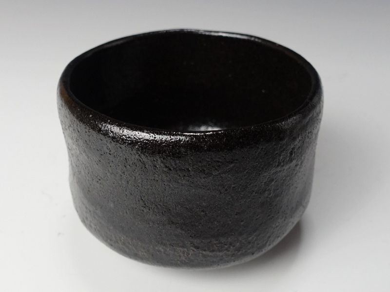 A Black Raku Tribute Tea Bowl by Kiraku Kizu