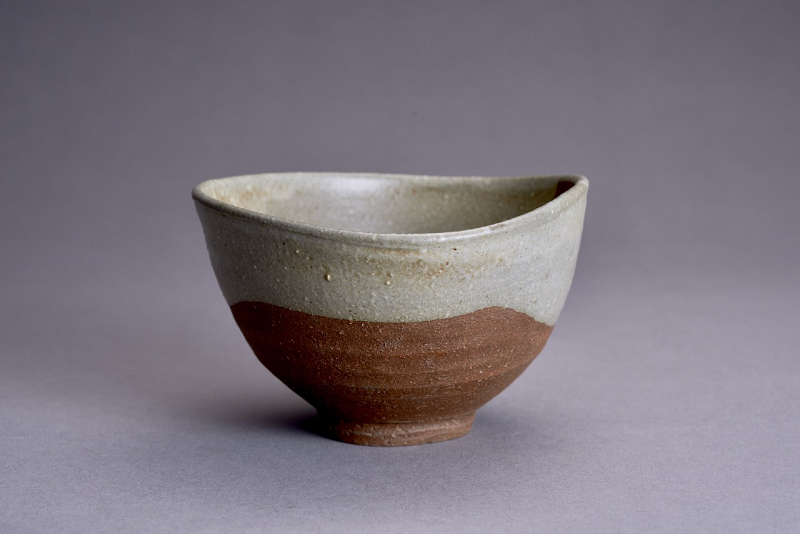 An Antique Karatsu Amigasa Tea Bowl with Shifuku