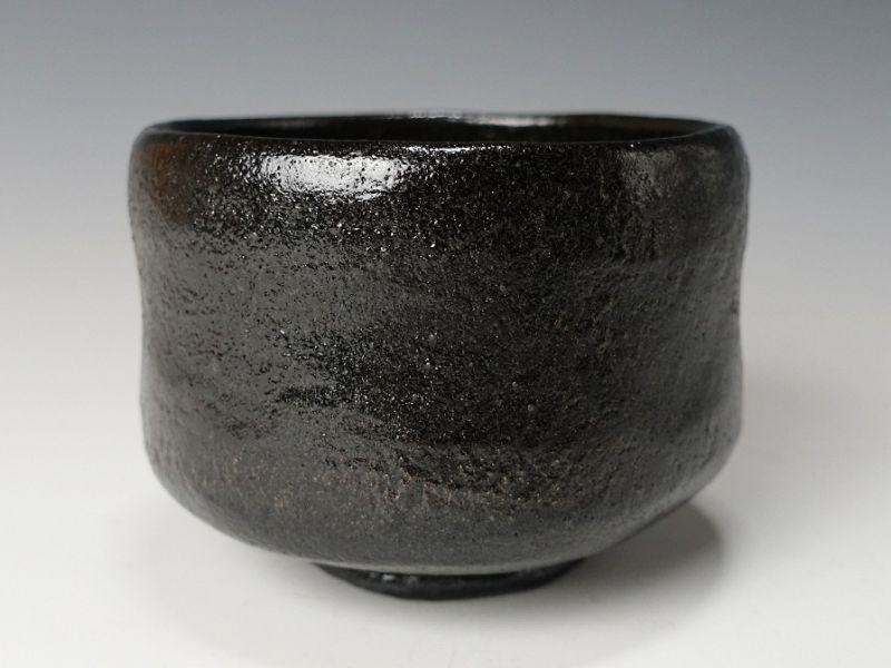 A Black Raku Tribute Tea Bowl by Kiraku Kizu