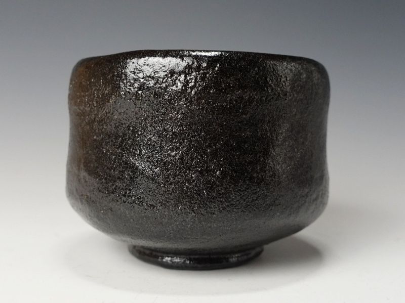 A Black Raku Tribute Tea Bowl by Kiraku Kizu