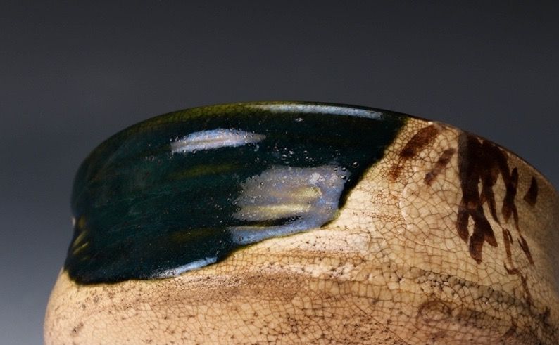An Edo Period Oribe Tea Bowl with Green Glaze