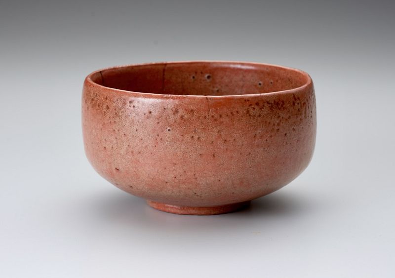 A Red Raku Tea Bowl by Tamamizu III - Nindosai (d.o.b. unknown -1763)
