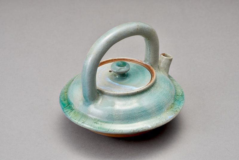 An Antique Celadon Chōshi for Sake with a Beautiful Gold Repair