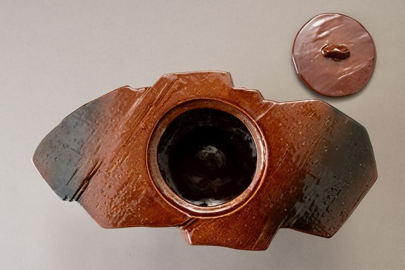 A Red “Ame” Glazed Mizusashi by 11th Generation Ōhi Chozaemon