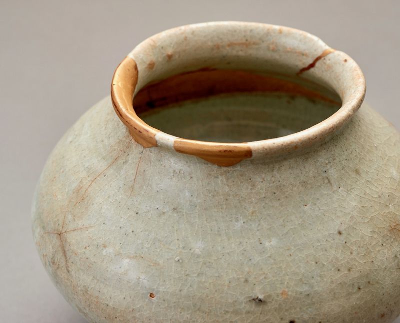 An Ancient Korean Celadon Vase with Gold Repairs