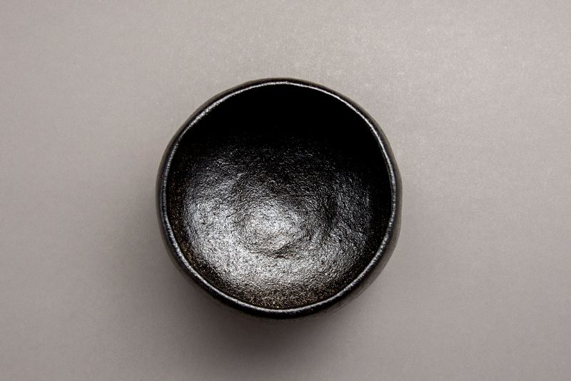 A Classic Black Raku Tea Bowl by Ōhi Chōzaemon IX