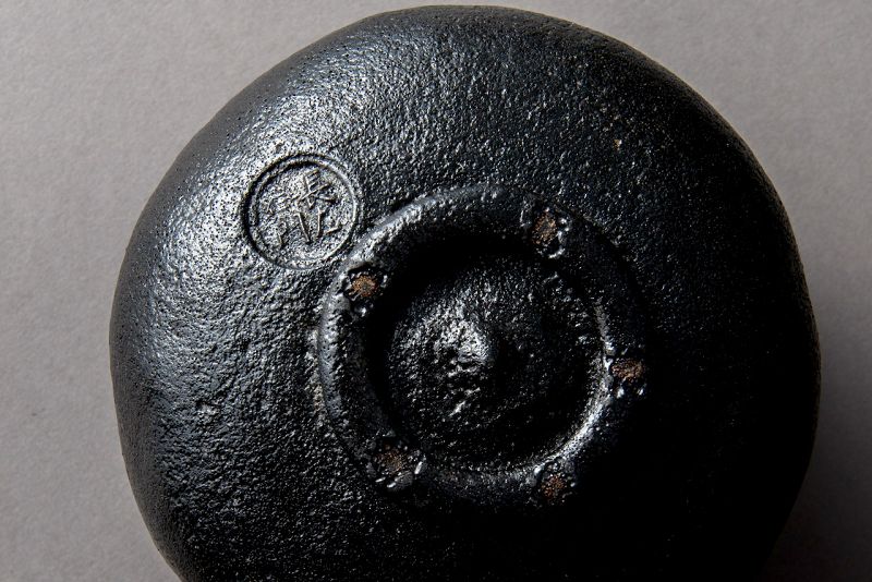 A Classic Black Raku Tea Bowl by Ōhi Chōzaemon IX
