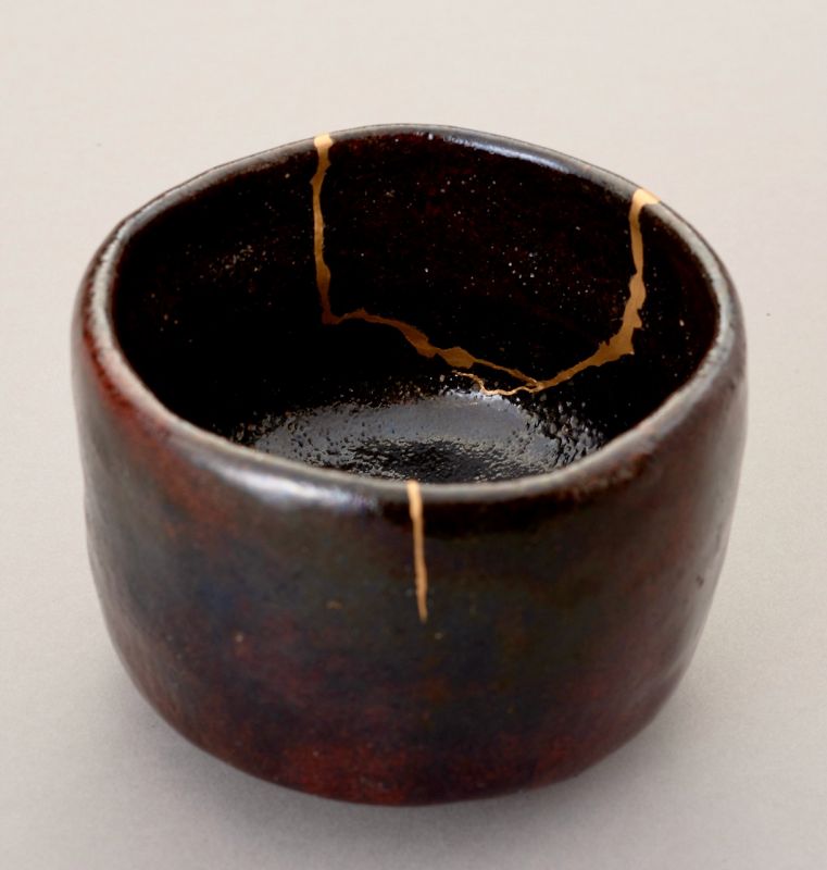An Exceptional Antique Raku Tea Bowl with Gold Repair