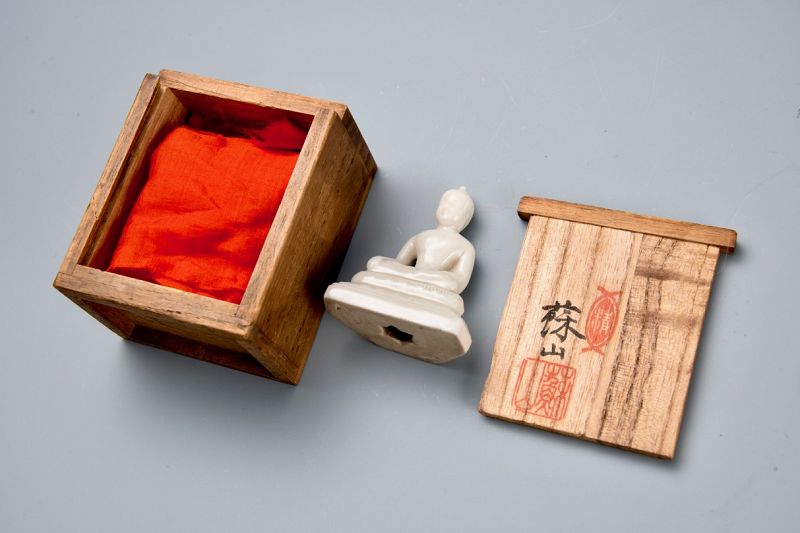 A Small Porcelain Seated Bodhisattva by Suwa Sozan