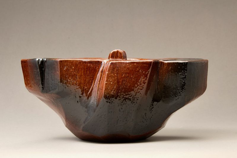 A Red “Ame” Glazed Mizusashi by 11th Generation Ōhi Chozaemon
