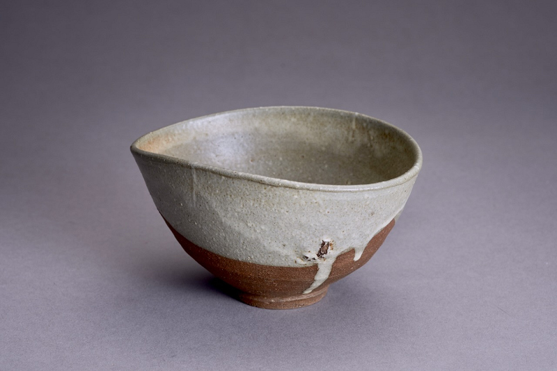 An Antique Karatsu Amigasa Tea Bowl with Shifuku