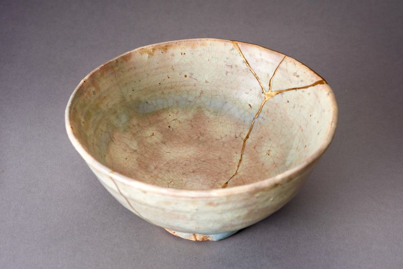 An Asahi-yaki Tea Bowl with Extraordinary Maki-e Gold Repairs