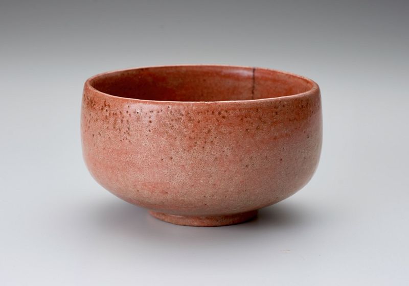 A Red Raku Tea Bowl by Tamamizu III - Nindosai (d.o.b. unknown -1763)