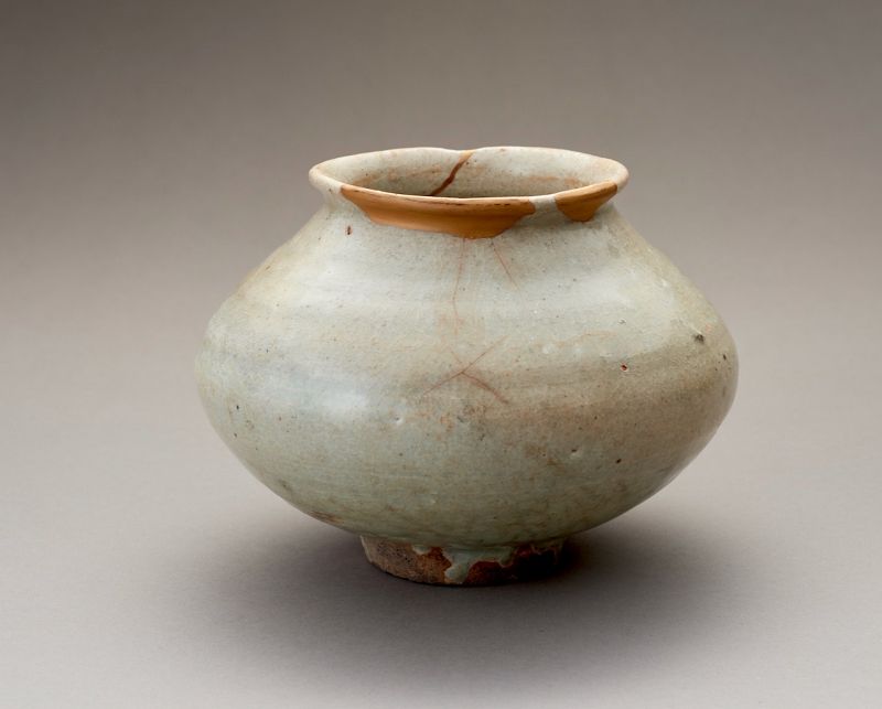An Ancient Korean Celadon Vase with Gold Repairs