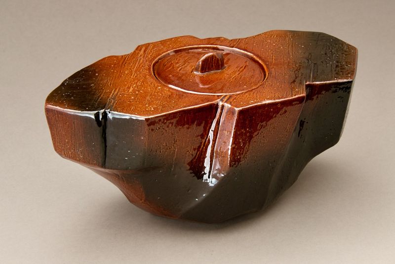 A Red “Ame” Glazed Mizusashi by 11th Generation Ōhi Chozaemon