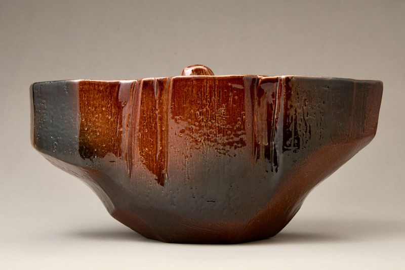 A Red “Ame” Glazed Mizusashi by 11th Generation Ōhi Chozaemon