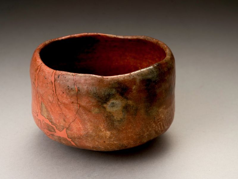 A Raku IX (Ryônyû) Red Tea Bowl with Extraordinary Lacquer Repairs