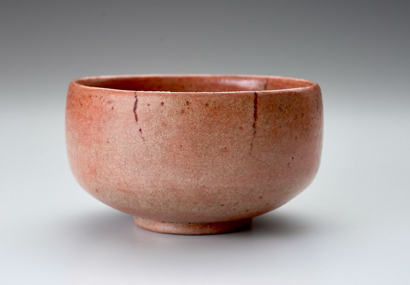A Red Raku Tea Bowl by Tamamizu III - Nindosai (d.o.b. unknown -1763)