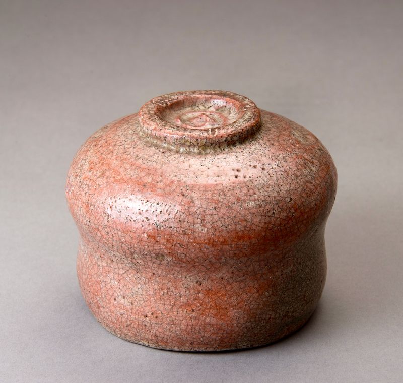 A Red Raku Tea Bowl by Famed Potter Ichigen (1662-1722)