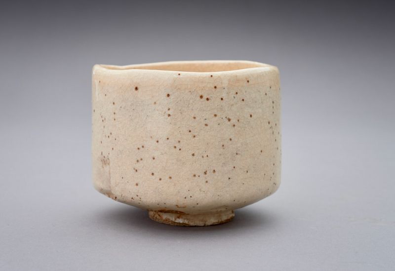 A White Raku Tea Bowl by First Generation Ito Tozan
