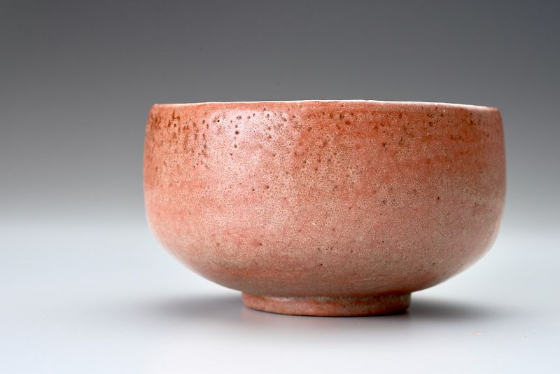 A Red Raku Tea Bowl by Tamamizu III - Nindosai (d.o.b. unknown -1763)