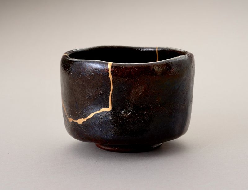 An Exceptional Antique Raku Tea Bowl with Gold Repair
