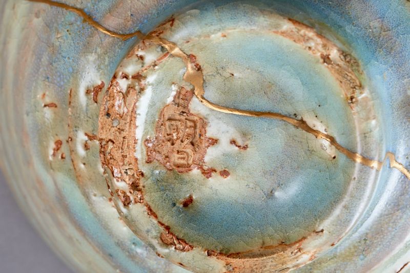 An Asahi-yaki Tea Bowl with Extraordinary Maki-e Gold Repairs