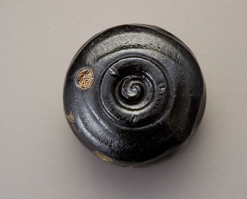 A Black Raku “Kazuin” Tea Bowl by Higaki Soroku