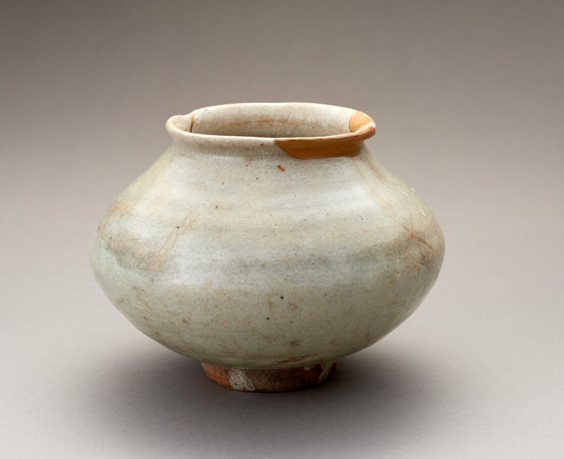 An Ancient Korean Celadon Vase with Gold Repairs