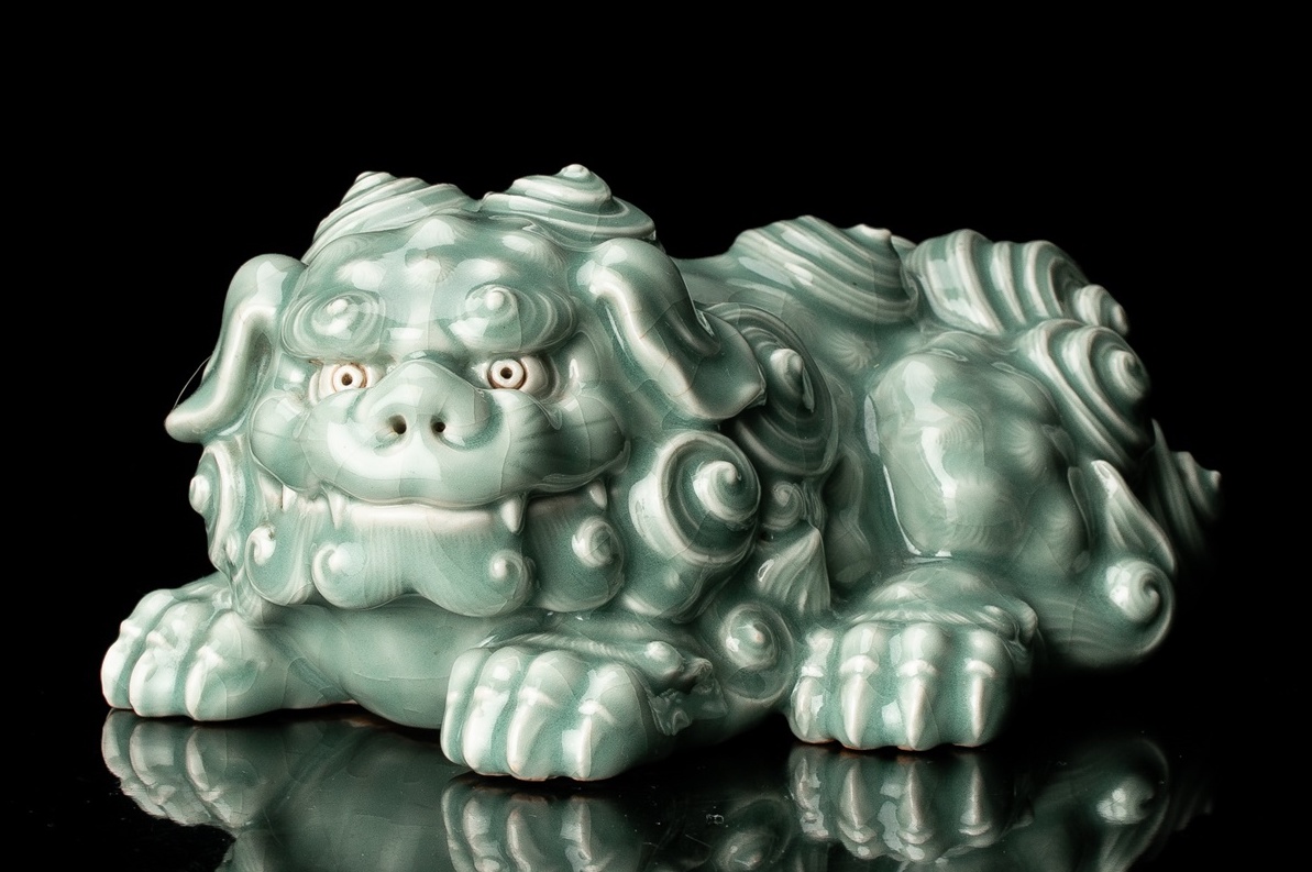 A Celadon Shishi Statue by first generation Miyagawa Kōzan (1842–1916)