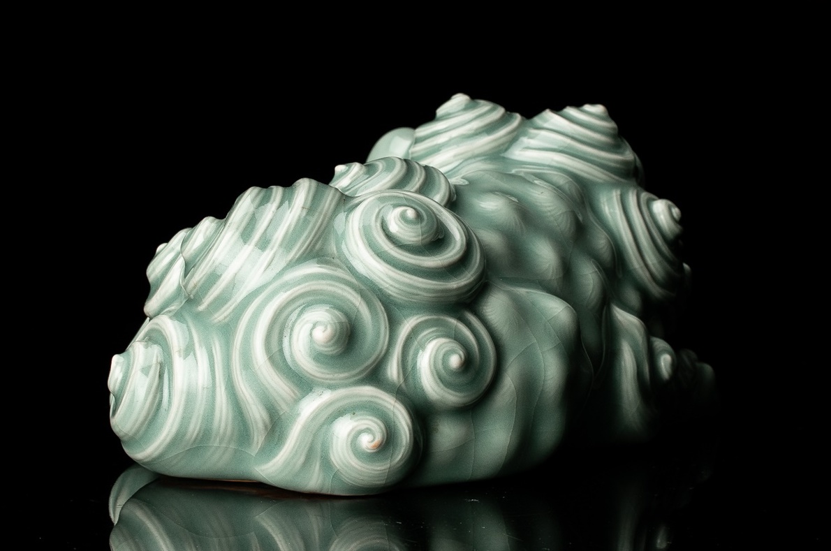 A Celadon Shishi Statue by first generation Miyagawa Kōzan (1842–1916)