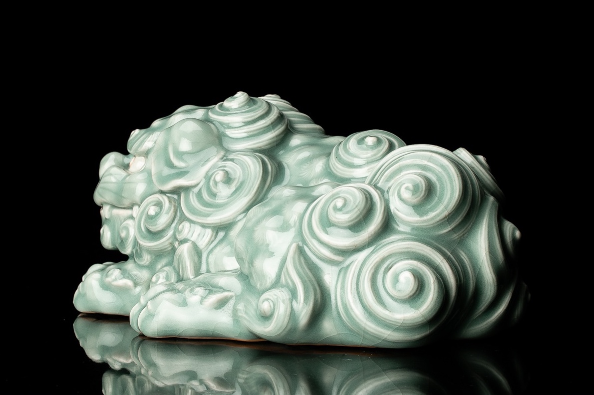 A Celadon Shishi Statue by first generation Miyagawa Kōzan (1842–1916)