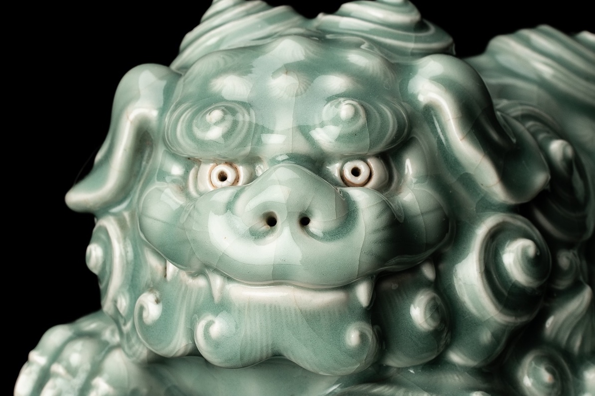 A Celadon Shishi Statue by first generation Miyagawa Kōzan (1842–1916)